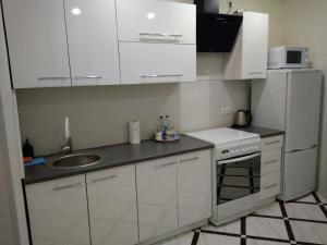 Köök või kööginurk majutusasutuses PaulMarieApartments on Beloborodova