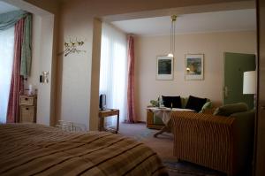 Postel nebo postele na pokoji v ubytování Haus Helvetia
