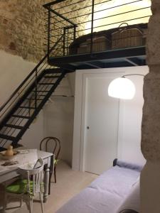 A bed or beds in a room at Dimora Le Zagare