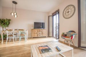 TV a/nebo společenská místnost v ubytování Apartamento Plaza Mayor Cáceres