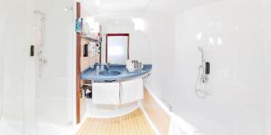 Vannituba majutusasutuses Novotel Suites Genève Aéroport