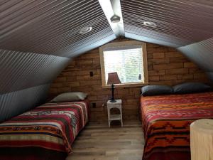 Voodi või voodid majutusasutuse K3 Guest Ranch toas