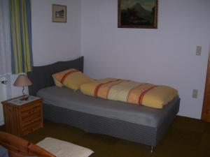 A bed or beds in a room at Log Home