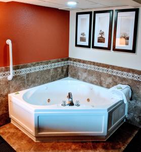 A bathroom at AmericInn by Wyndham Grand Forks