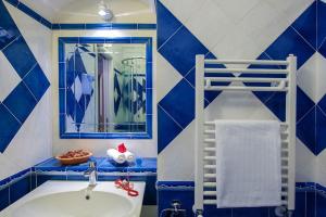 Um banheiro em Hotel Il Gabbiano