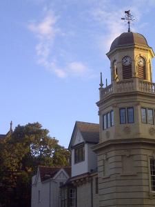 a building with a clock tower on top of it at Bath Place Hotel in Oxford