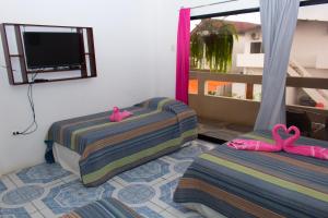 Μια τηλεόραση ή/και κέντρο ψυχαγωγίας στο Hostería "El Paraíso"