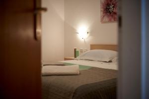 Posteľ alebo postele v izbe v ubytovaní Apartments Proto