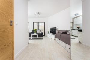 Postel nebo postele na pokoji v ubytování apartament studio solna 1 M19