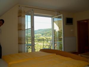 Fotografie z fotogalerie ubytování Wein- und Gästehaus Genetsch v destinaci Lieser