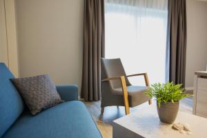 Posezení v ubytování Nordsee Lodge