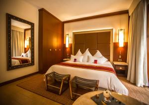 Cama ou camas em um quarto em Sumaq Machu Picchu Hotel