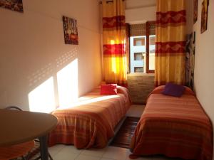 Postel nebo postele na pokoji v ubytování B&B Alghero Republic