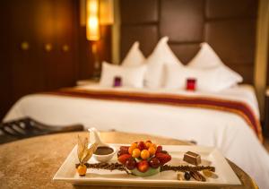 Cama ou camas em um quarto em Sumaq Machu Picchu Hotel