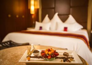 Cama ou camas em um quarto em Sumaq Machu Picchu Hotel