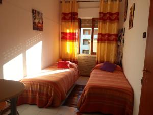 Postel nebo postele na pokoji v ubytování B&B Alghero Republic