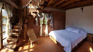 Postel nebo postele na pokoji v ubytování Cabañas villa de San Miguel