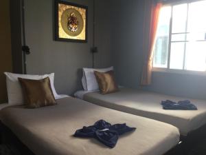 Postel nebo postele na pokoji v ubytování North Star Guest House
