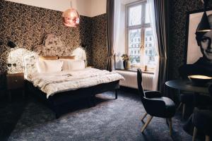Säng eller sängar i ett rum på NOFO Hotel, WorldHotels Crafted