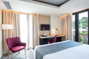 Postel nebo postele na pokoji v ubytování Best Western Kutaisi City Center