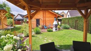 Ein Garten an der Unterkunft Spreewaldhäuser Wiesner