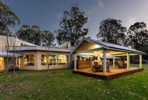 a house with a porch with a deck at Inn The Tuarts Guest Lodge Busselton Accommodation - Adults Only in Busselton