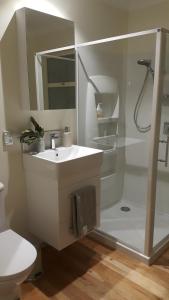 Ванная комната в Blooming Delight Tauranga