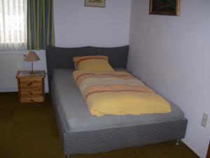 A bed or beds in a room at Log Home