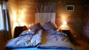 Krevet ili kreveti u jedinici u okviru objekta Chalet Beauroc