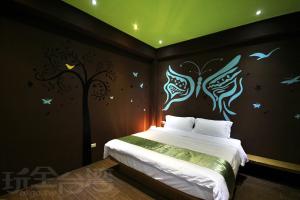Postel nebo postele na pokoji v ubytování Beauty House Homestay