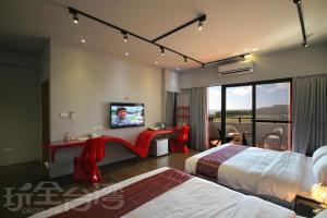 Postel nebo postele na pokoji v ubytování Beauty House Homestay