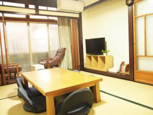 TV in/ali zabaviščno središče v nastanitvi Matsue Guesthouse