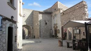 an alley in an old stone building with a tent at Casa Ladyhawke in Santo Stefano di Sessanio