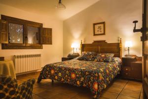 Cama o camas de una habitación en Dehesa de Montealto