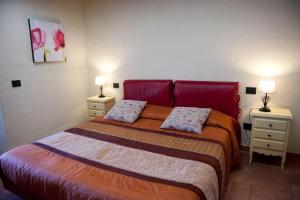 A bed or beds in a room at Thalassa Locanda B&B e appartamento