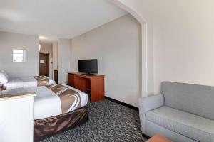 Postel nebo postele na pokoji v ubytování Quality Suites