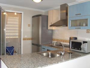 Kuchnia lub aneks kuchenny w obiekcie 2 dorm.A/A.Vista mar.WiFi.Gym.Sauna.Terraza.Parking.