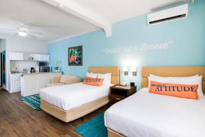Voodi või voodid majutusasutuse Margaritaville Beach Resort Playa Flamingo toas