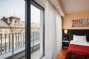 Posteľ alebo postele v izbe v ubytovaní Exe Budapest Center