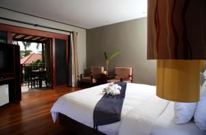 Postel nebo postele na pokoji v ubytování Chongfah Resort Khao Lak - SHA Extra Plus