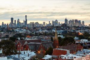 a view of a city with a city skyline at Birdcage Penthouse Luxury Melbourne Ultra Modern Industrial Chic in Melbourne