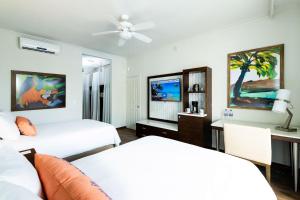 Voodi või voodid majutusasutuse Margaritaville Beach Resort Playa Flamingo toas