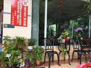 Restoran või mõni muu söögikoht majutusasutuses Wen Sha Bao Motel-Xinying