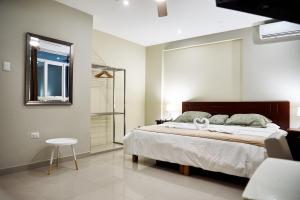Posteľ alebo postele v izbe v ubytovaní LC Hoteles Piura