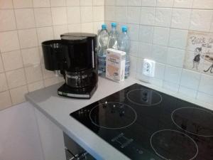 Kuchyňa alebo kuchynka v ubytovaní livingROOM_Wroc_Mosiężna