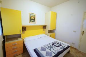 Postel nebo postele na pokoji v ubytování Villetta 4B