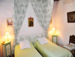 Postel nebo postele na pokoji v ubytování Château du Max