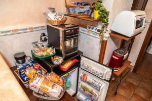 Kuchyň nebo kuchyňský kout v ubytování Hotel Barrett
