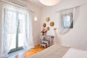 Ένα ή περισσότερα κρεβάτια σε δωμάτιο στο SUN DROP VILLA I, DRIOS-PAROS +19 φωτογραφίες