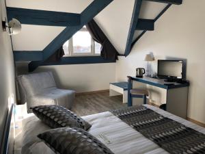 Postel nebo postele na pokoji v ubytování Hôtel Pédagogique Coeur d'Apcher